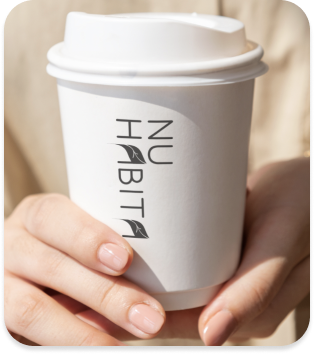 project cover image the logo designed for Nu Habita in a coffee takeaway cup